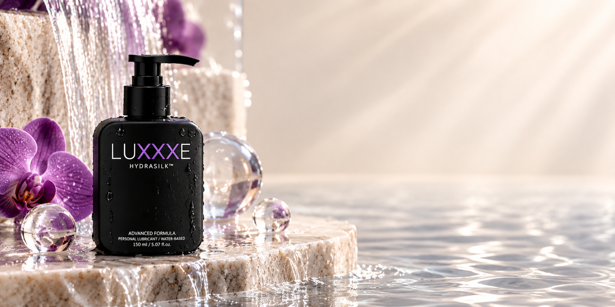 LUXXXE Hydrasilk hyaluronic acid lubricant in a luxury intimate wellness setting